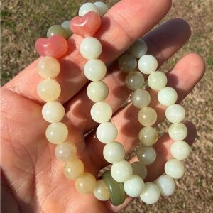 set of 2 Beige Brown tone 8mm Stacking Bracelets with red agate heart bead